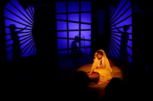 Actress Sushma Koirala during a performance of the play 'Bimba ka Sapana' at Theater Mall, Kathmandu on Wednesday. Koirala plays the role of Budhha's wife.