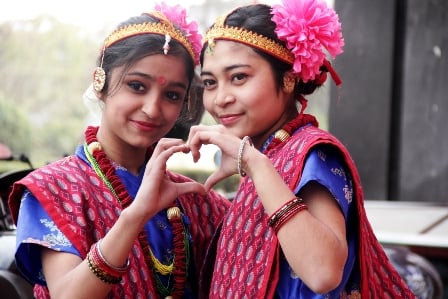 SAY CHEESE: Schoolgirls pose for a photo before their dance performance at City Hall, Kamaladi on Monday afternoon.