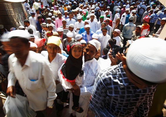 A man poses with his daughter inside Kashmiri Masjid, Kathmandu on the day of Eid al-Fitr on Thursday.