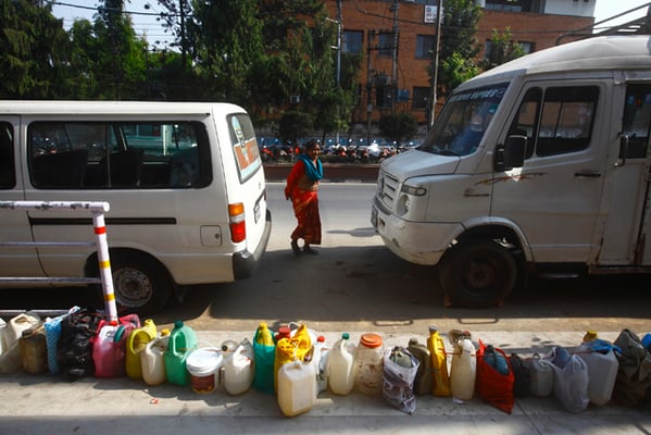 64-year-old Chiran Devi Tamang from Bagbazar waits in line for kerosene at Pulchowk on Sunday. The ongoing blockade has caused severe fuel shortage in the country.