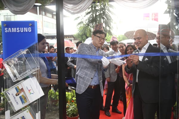 (l-r) B.K. Yoon, CEO and President of Samsung Electronics with Shekhar Golchha of Him Electronics jointly inaugurates the newly renovated Samsung Plaza at Durbar Marg on Thursday.