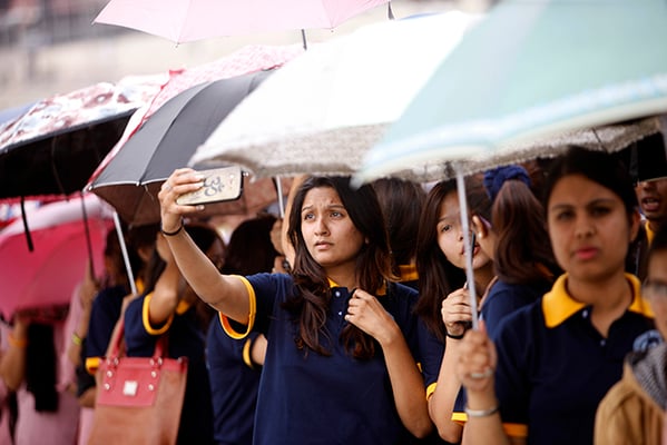 A girl takes a selfie during International Youth Day celebrations at Maitighar Mandala on Wednesday.