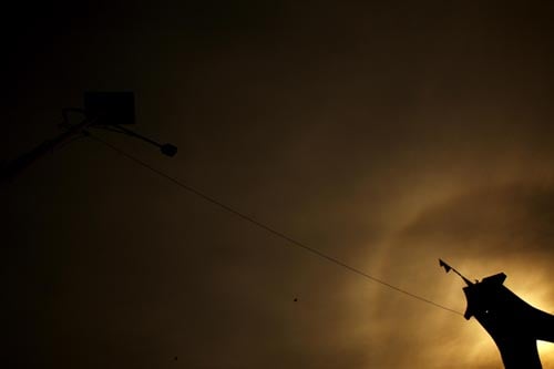 Solar halo seen behind Shahid Gate on Saturday. Such rings are formed when sunlight passes through ice crystals in cirrus clouds.