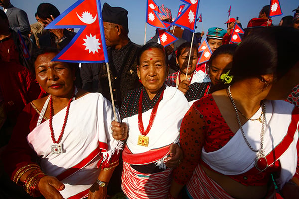 Women in traditional attire participate in the program "Peace and Harmony United" organised by Lions Club of Kathmandu at Maitighar Mandala on Saturday.