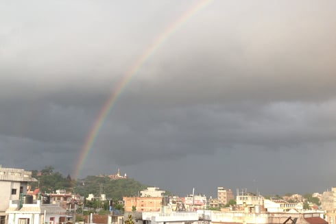 PEACE SIGN: A rainbow arcs above Swoyambunath on Sunday afternoon.