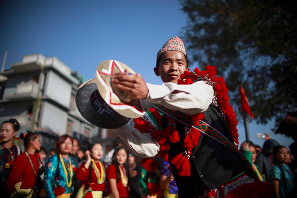 People of the Kirat community dance during Sakela to celebrate Udhauli festival in Nakhipot on Tuesday.