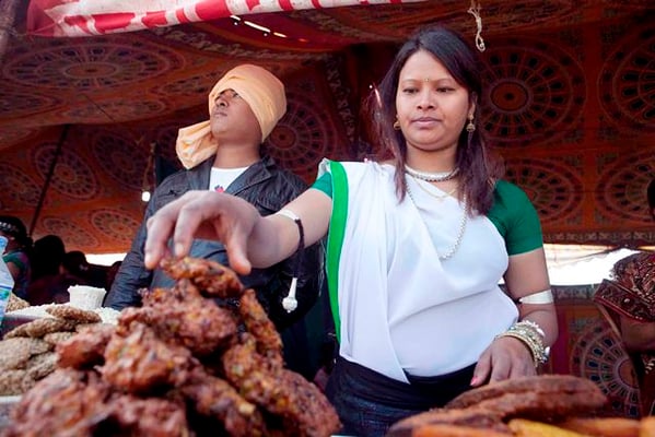 GET READY: A woman from Tharu community prepares food for Maghe Sankranti in Kathmandu on Monday. Maghe Sankranti is similar to solstice festivals in other traditions.
