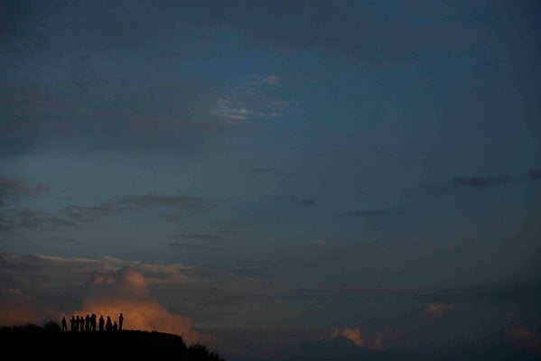 People enjoy the sunset at Chobhar on Saturday.