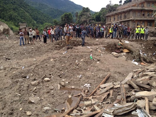 Rescue workers search for survivors following the Bhote Koshi landslide. 11 dead bodies have been recovered so far on Monday.