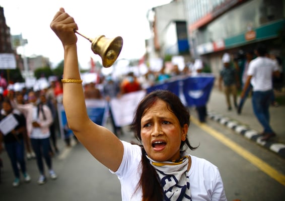 People participate in a rally in Kathmandu on Saturday to support Dr. Govinda KC's fast-unto-death which has reached 13 days.