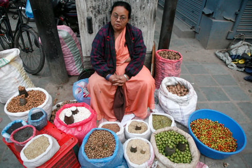 FESTIVAL SHOPPING: A woman waits for customers who come to buy Tihar essentials, at Bhedasingh on Wednesday.