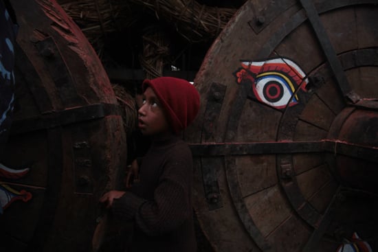 A boy looks up at the chariot of Seto Machendranath on Sunday.