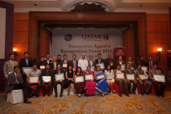 Qatar Airways has felicitated Nepal's travel agents who contributed to its business in 2014-2015 during an event organised in Kathmandu on Thursday. Qatar’s ambassador to Nepal Ahmed Jassim al-Hamar poses for a group photo with the felicitated agents after the event.