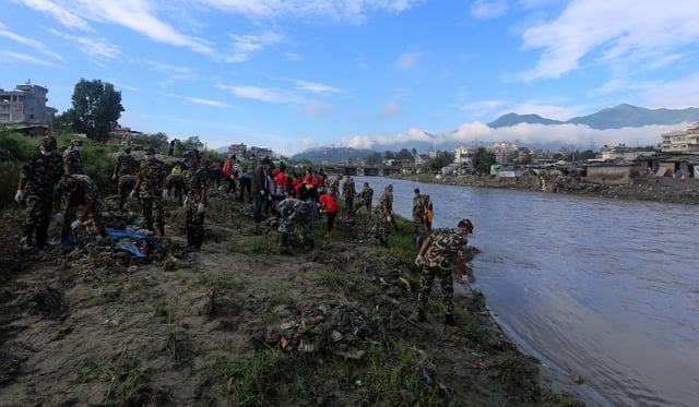 The Nepal Army and Nepal Police along with various other organisations extracting garbage from Bagmati as part of the Bagmati Clean Up Campaign on Saturday in Balkhu, Kathmandu.