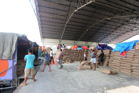 Bags of rice sent by Bangladesh are collected inside a truck to be taken as relief aid around affected areas on Tuesday.