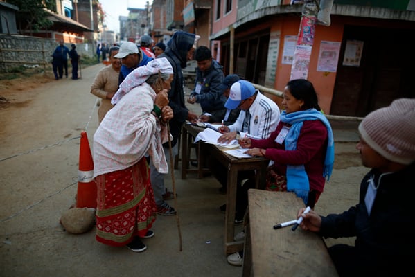 People line up to casts their votes in Baglung during the first phase of parliamentary and provincial elections on Sunday.