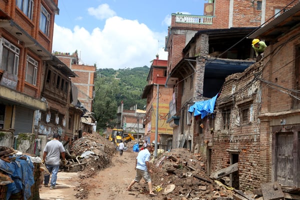 Three months after the 25 April earthquake, the locals of Sankhu, Kathmandu are still busy demolishing their damaged houses and managing debris.