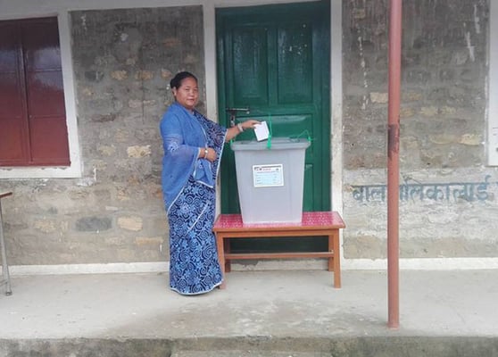 Speaker Onsari Gharti Magar casts her vote in the second phase of local elections on Wednesday in Rolpa district, where she was a Maoist guerrilla during the war.