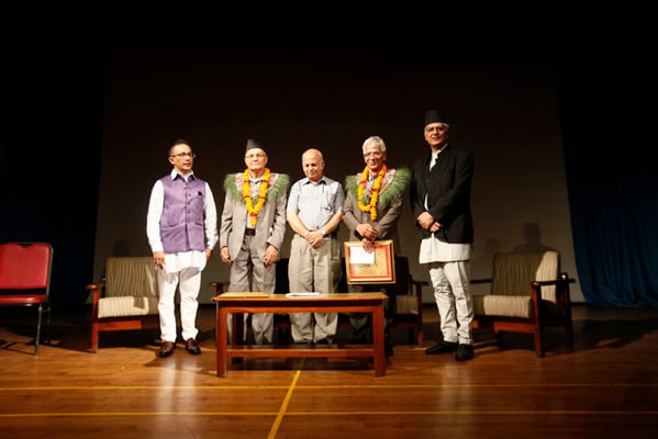 Winner of the Madan Puraskar Prize Ghanashyam Kandel (second from left) with winner of Jagadamba Shree Cartoonist Durga Baral 'Batsyayan' (second from right) and heritage specialist Sudarshan Tiwari at an award function in Patan on Friday.