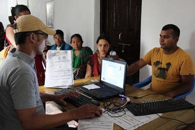 NEXT PLEASE: Voters line up at the District Election Office in Kathmandu on Friday to register for the upcoming CA elections.