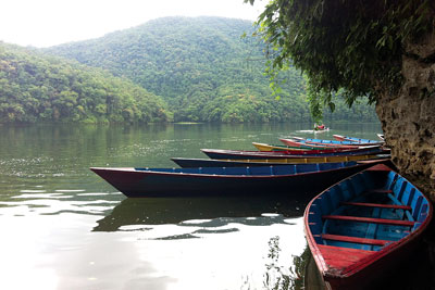STILL WAITING: Boats await customers at the bank of Phewa Lake in Pokhara.