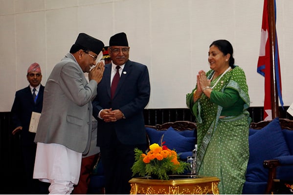 Newly appointed Chief of the Commission for Investigation of Abuse of Authority (CIAA) Deep Basnyat formally greets President Bidya Devi Bhandari after being sworn in at Shital Niwas on Monday.