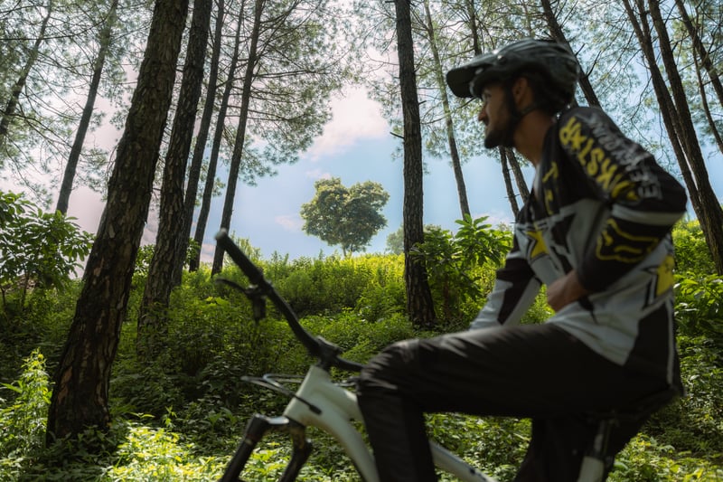 Tejson Kunwar at the forest before the construction of the trail.